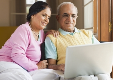 Couple Looking at Laptop
