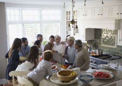 Large Family Gathered in Kitchen