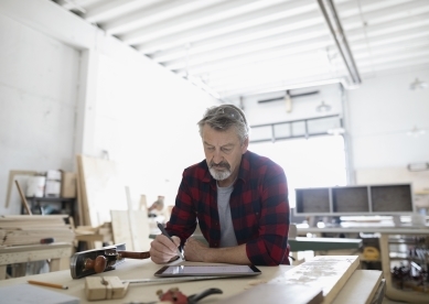 Man in woodworking studio